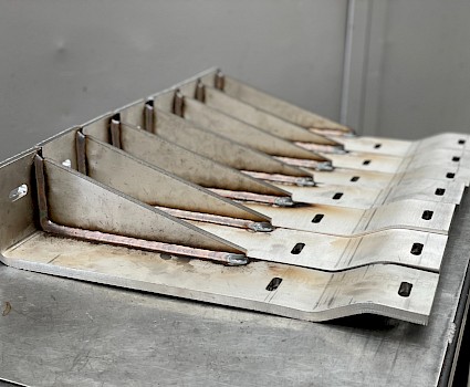 Bent and welded brackets